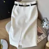 Procesamiento personalizado 2026 Primavera/Verano Nuevo Sentido Súper Atractivo Falda Media Falda de Traje para Mujer de Oficina Falda Media Sexy Falda Midi Bolso