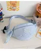 Nueva bolsa cruzada de lona ligera para el pecho, riñonera de nicho para mujer, bolsa de deporte tipo dumpling simple y versátil, bolso de hombro resistente al agua