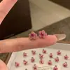 Pendientes de borlas de flores coloridas súper de cuento de hadas, pendientes de botón y argollas dulces de nicho de alta gama, pendientes exagerados estilo vacacional