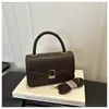Moda Casual Simples Novo Estilo Coreano 2026 Minimalista Cor Sólida Ombro Único Transversal Fresco de Mão Pequena Quadrada Bolsa Feminina