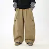 Calça estilo japonês infantil 2026 novo modelo outono para meninos calça casual simples de perna reta com bolsos para bebês e crianças pequenas calça cargo da moda