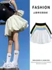 Falda Short con Botón de Flor Blanca para Mujer 2026 Nuevo Verano Esponjoso Falda Línea A Petite Anti-exposición Falda Corta Hot Girl
