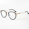 Gafas para miopía TR90 estilo coreano retro con borde fino y marco redondo hueco, montura de red lisa popular, espejo plano anti-luz azul