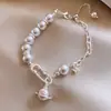 Pulsera Única de Ojo de Tigre Manta Rosa Saturno Lujo Ligero Diseño de Nicho Elegante Versátil Joyería para Mujer