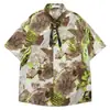 Camisa de Manga Curta com Estampa de Planta Tropical Borrada em Aquarela para Homens e Mulheres, Camisa Casual Solta de Verão 2026 para Homens
