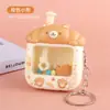 Máquina de Garra Mini Fofa e Divertida Brinquedo Infantil Tamanho Pequeno Pegador de Bonecas Chaveiro Atacado