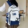 Mochila 2024 nova mochila escolar para estudante do ensino fundamental estilo coreano moda cor contrastante mochila grande capacidade marca de moda bolsa comércio exterior