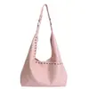 Bolsa Tote Feminina Grande Capacidade Retro com Rebites de Alto Padrão Transfronteiriça Nova Tendência Primavera 2026 Bolsa de Ombro Estilo Biker Cool