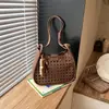 Moderna Bolso Cubo Grande Nuevo para Mujer 2026 Estilo Coreano Hueco Bolso de Hombro Único Versátil Bolso Cruzado para el Viaje Diario