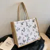 Bolso Tote de Lino Impermeable de PU Nuevo Bolso de Mano Transfronterizo Bolso con Textura Estampada Color Mariposa Bolso de Mujer