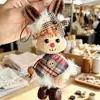 Encantador perrito peludo con la lengua fuera, llavero para bolso, colgante de dibujos animados natural, semillas de terapia de sonido curativas, popular en zonas escénicas, amuleto divertido y adorable