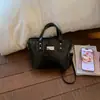 Bolso de Cuero en Relieve Vintage de Gama Alta para Mujer 2026 Nueva Moda Bolso Cruzado Versátil Bolso de Mano Súper Popular Bolso Tipo Cubo