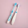 Cepillo de dientes para niños cerdas suaves al por mayor paquete individual cepillo de dientes para niños de 3 a 12 años cepillo de dientes para limpieza bucal suministro de fábrica