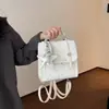 Mochila Única de Lunares para Mujer Nueva Primavera 2026 Versátil Mochila de Viaje Exquisita Color Sólido Pequeña Bolsa Escolar Moderna