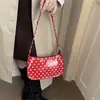 Bolsa feminina de verniz brilhante com bolinhas de nicho, nova moda 2026, bolsa transversal versátil, bolsa de ombro e para usar sob o braço atacado