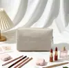 Bolsa de Cosméticos de Seersucker de Venta Caliente Transfronteriza de Mano de Gran Capacidad Bolsa de Lavado Bordada a Rayas Bolsa de Almacenamiento de Cosméticos para Viaje