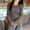 Elegante y estiloso suéter de punto para mujer, nuevo modelo de principios de otoño 2025, con bordes de volantes, adecuado para usar en capas, top de suéter de cuello redondo