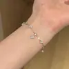 Pulsera de Circonia de Trébol de Cuatro Hojas de Alta Retención de Color para Mujer, Lujo Ligero, Sensación de Alta Gama, Joyería de Mano de Flor Completa de Diamantes, Exquisita, Moderna, Versátil