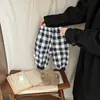 Calça de Moletom Xadrez Estilo Coreano Retro para Bebês Primavera e Outono Nova Calça Jogger Casual Solta para Bebês e Crianças Pequenas Calça Longa Estilosa