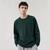 Producto popular transfronterizo nuevo: Camiseta base de manga larga para otoño e invierno con cuello redondo para hombre en color rojo ladrillo 2026, camiseta larga de color liso de corte holgado y versátil