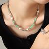 Estilo tailandés nicho ins perla de imitación bola de acero piedra de cristal costura cruzada acero de titanio collar al por mayor joyería femenina que no se decolora