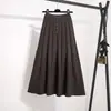 Falda de punto suave y acogedora para mujer de comercio exterior transfronterizo, falda de lana de cintura alta adelgazante para otoño e invierno, falda plisada de línea A de dobladillo ancho de longitud media
