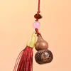 Palo de rosa amarillo africano tallado hueco calabaza sachet jarrón colgante difusor adorno llavero colgante