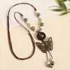 Collar con colgante de campana de mariposa de cerámica de estilo étnico retro para mujer, diseño nuevo y moderno, cadena larga para suéter, accesorios