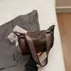 Bolsa de mão feminina retrô de comércio exterior 2026 novo estilo bolsa feminina moderna personalizada transversal de ombro bolsa de dumpling estilosa para o dia a dia