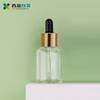 Xiying en stock 30ml hombro inclinado Vidrio 4 colores frasco gotero Loción esencia líquido cosmético vidrio sub-botella
