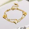 Pulsera de Gafas de Lectura de Acero de Titanio con Trébol de Cuatro Hojas Estilo Europeo y Americano para Mujer Chapada en Oro de 18K Accesorios de Joyería de Mano Estilo Ins de Alta Gama