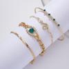 Europa y Estados Unidos transfronterizo más vendido imitación gema strass ojos de amor redondo hueco incrustado diamante verde traje de pulsera de amor