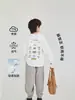 Camiseta de otoño para niños, cómoda camiseta básica de manga larga, nuevo modelo 2026, top versátil de moda infantil para principios de otoño