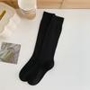 Calcetines de mujer con estampado oscuro, color liso, para otoño e invierno, hasta la rodilla, estilo universitario, estilo Han Dong, combinables fácilmente.