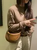 Design único, moderno, retrô e de alta qualidade, bolsa feminina em formato de croissant, estilo minimalista, bolsa de ombro versátil, bolsa transversal e bolsa de sela sob o braço