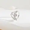 Anillo Abierto con Forma de Corazón Hueco Bañado en Oro Real Anillo de Zirconia Dorada Moda Coreana Tendencia al por Mayor Anillo para Dedo Comida Roja de Internet para Mujer