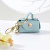 Venta al por mayor Mini Bolsa Pequeña de Cuero PU Llavero Creativo Bolsa para Llaves de Coche Colgante Monedero Exquisito Pequeño Regalo