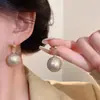 Brincos de pérola de luxo leve estilo coreano para mulheres, populares online, de alta qualidade, simples e versáteis, brincos da moda estilo ins atacado