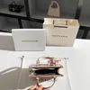 Una generación de bolsa de mano jacquard de diseño pequeño de alta gama 2025 nueva bolsa de mensajero portátil al por mayor