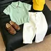 Estilo Coreano Camisa de Punto para Niños Verano 2026 Nueva Verde Bordado Hueco Cuello Polo Manga Corta Pantalones Casuales para Niños Modernos