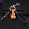 Doce Signos del Zodiaco Calabaza de Madera de Durazno con Llavero de Barra de Oro Hebilla de Cinturón de Cuero Colgante de la Suerte Zodiacal Regalo de Negocios