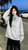 Sudadera de punto medio de manga larga, diseño moderno y único para mujer, nuevo estilo casual otoño/invierno 2026 ins