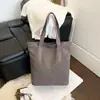 Bolsa de Lona para Mulheres 2026 Nova Popular Moda Outono Estudante Escolar Comutador Bolsa de Ombro Bolsa Tote de Grande Capacidade