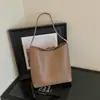 Bolso casual de axila estilo coreano, bolso de hombro de gran capacidad, nuevo bolso cubo retro trendy para el otoño de 2026