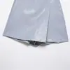 Atacado Fabricante de Roupas Femininas Transfronteiriças 2026 Novo Estilo Europeu e Americano Moda Sexy Hot Girl Cor Sólida Couro Sintético Calça Saia de Botão Duplo