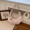 Nova bolsa de axila de alta moda estilo coreano de nicho para mulheres 2026, bolsa de ombro elegante em couro macio, bolsa transversal versátil e estilosa