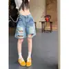 Shorts de mezclilla de cinco puntos rectos de pierna ancha talla grande para mujer, diseño versátil moderno estilo americano, verano 2026, nuevos rotos
