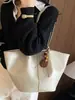 Bolsa de mano grande transfronteriza para mujer, nueva moda otoño 2026, bolso de hombro, elegante y versátil para el trabajo y los desplazamientos