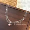 Colar de franjas de pérolas vintage estilo francês, um acessório chique e elegante para mulheres, perfeito para o uso diário e para adicionar um toque de sofisticação a qualquer look.