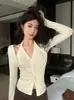 Diseño de Estilo Chica Caliente Americana Chaleco de Cuello Halter Cárdigan de Manga Larga con Tirantes Traje de Moda Nuevo Otoño 2025 para Mujeres